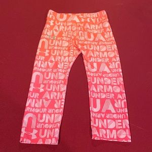 Girl’s orange Under Armour dry fit leggings size 6x
